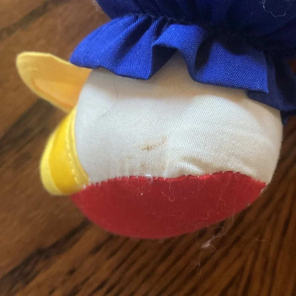 90’s learn and play clown plush primary colors